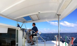 Kake2Kale - Sailing Greece - Hubby At The Helm